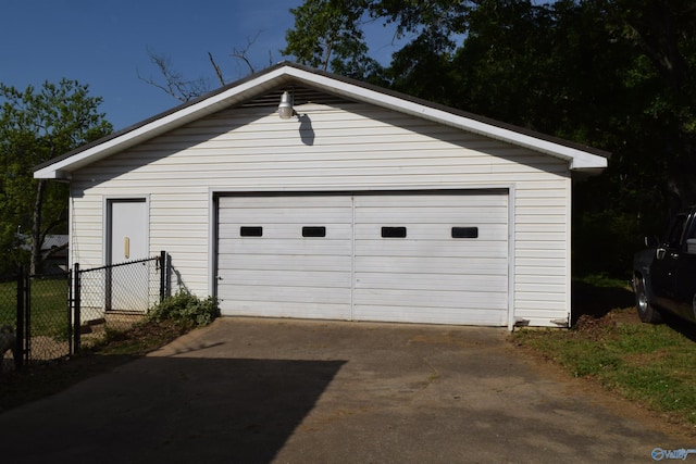 detached garage with fence