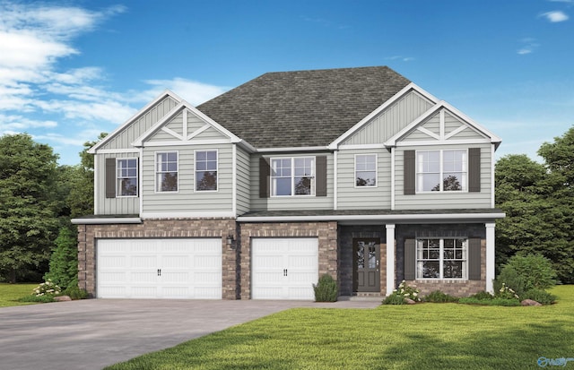 view of front facade with a garage and a front lawn