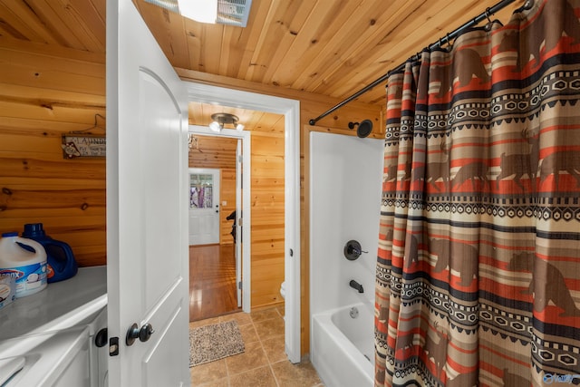 bathroom featuring tile patterned flooring, wooden ceiling, shower / tub combo with curtain, and wooden walls