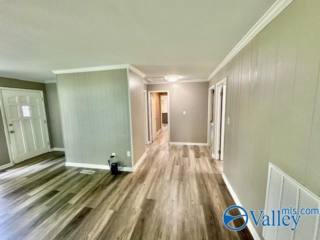 196 Johnson St, Rainsville, AL 35986 - hall featuring wood finished floors, ornamental molding, and baseboards