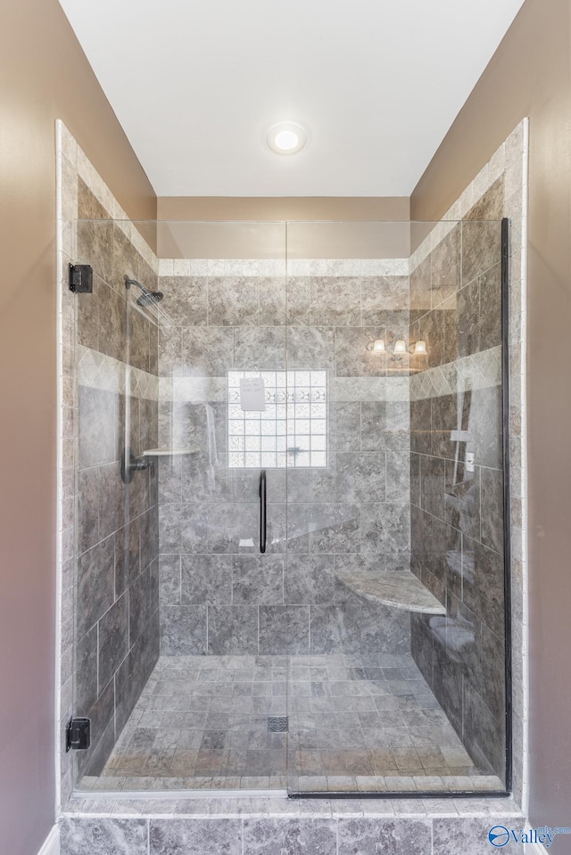 bathroom featuring an enclosed shower