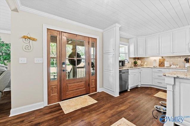 interior space featuring dark wood-type flooring, crown molding, wooden ceiling, and baseboards