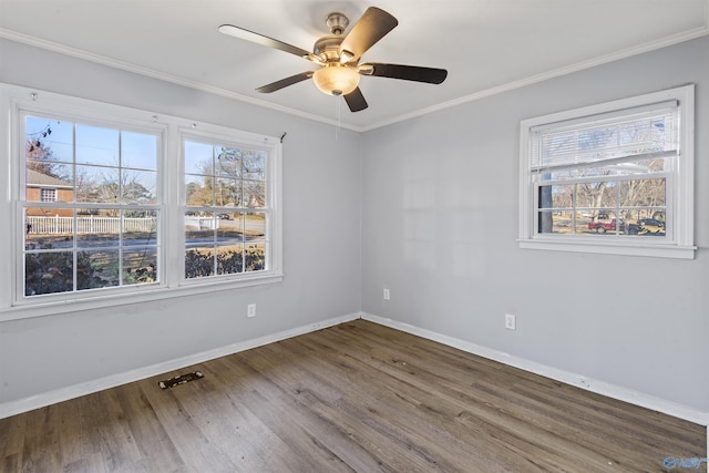 unfurnished room featuring hardwood / wood-style flooring, ceiling fan, and ornamental molding