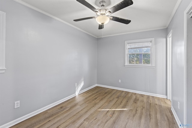 unfurnished room with crown molding, light hardwood / wood-style flooring, and ceiling fan