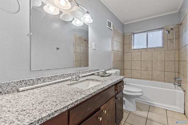 full bathroom featuring vanity, tiled shower / bath combo, crown molding, tile patterned flooring, and toilet