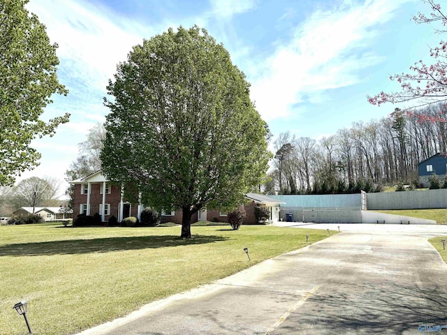 view of road with driveway
