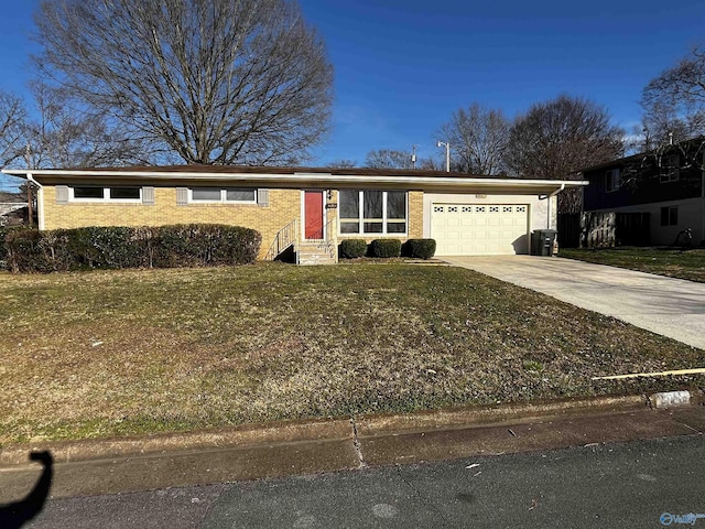 single story home featuring brick siding, concrete driveway, entry steps, a front yard, and a garage