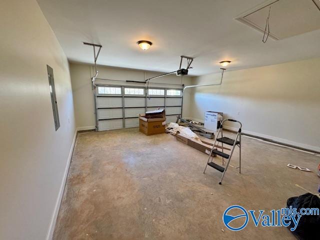 garage featuring electric panel and a garage door opener