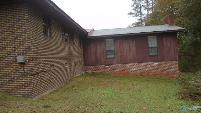 view of home's exterior featuring a lawn