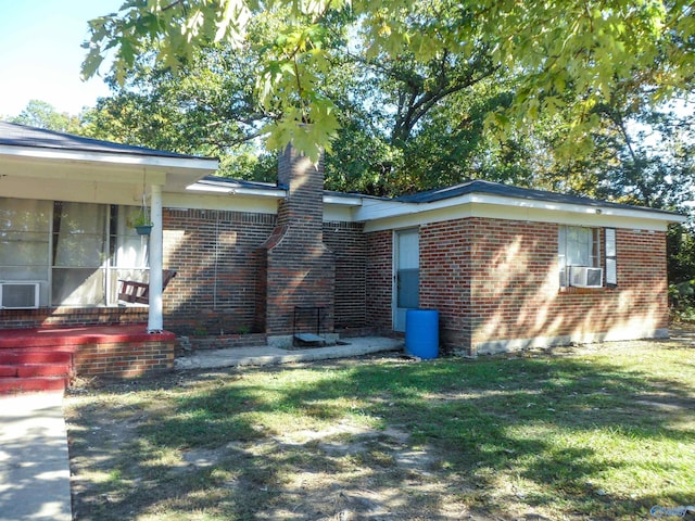 exterior space with a front yard