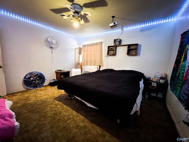 bedroom with ceiling fan and carpet floors