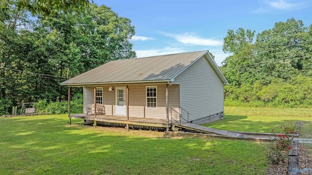 1073 6th St S, Sylvania, AL 35988 - view of front of property featuring a front lawn, a porch, and a metal roof