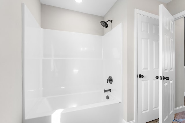 bathroom featuring washtub / shower combination