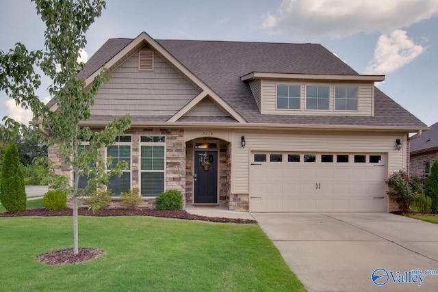 craftsman inspired home featuring a garage and a front lawn