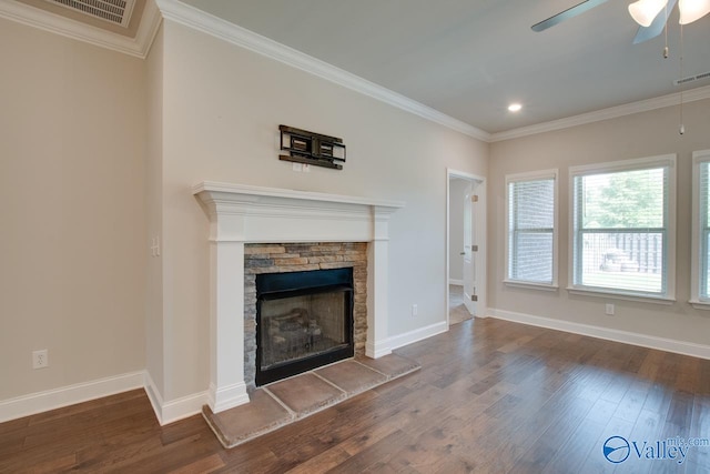 unfurnished living room with ceiling fan, wood-type flooring, ornamental molding, and a fireplace