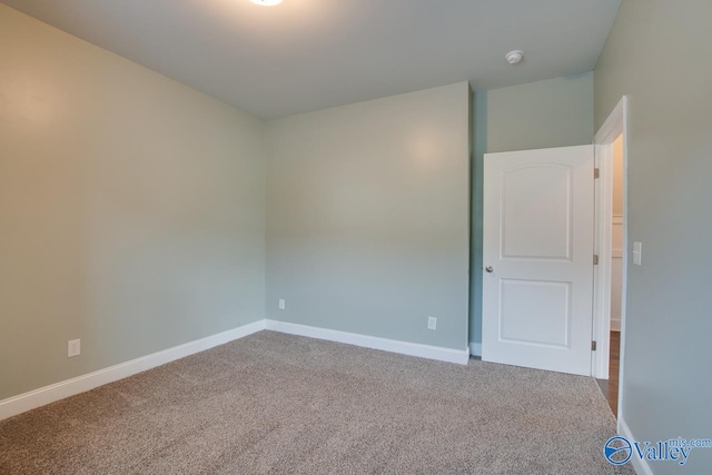 view of carpeted spare room