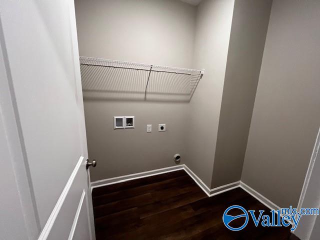 laundry room with hookup for an electric dryer, washer hookup, and hardwood / wood-style flooring