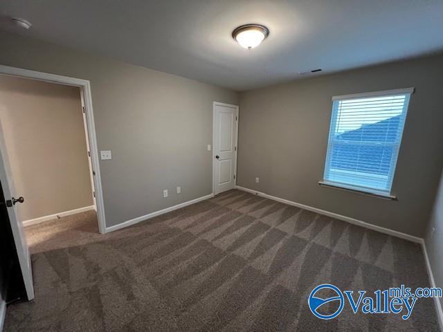 view of carpeted spare room