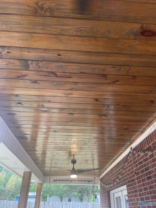 exterior details featuring wooden ceiling