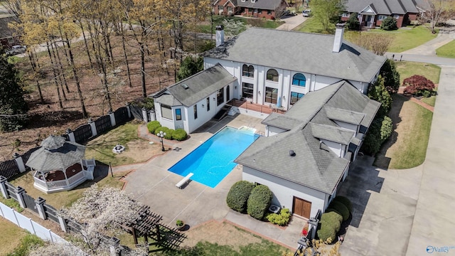 view of swimming pool with a fenced backyard, a fenced in pool, and a patio area