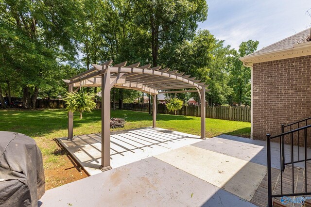 238 Riverwalk Trl, New Market, AL 35716 - fenced backyard with a pergola and a patio