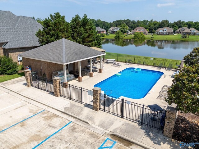 238 Riverwalk Trl, New Market, AL 35716 - community pool with a patio area, a water view, and a residential view