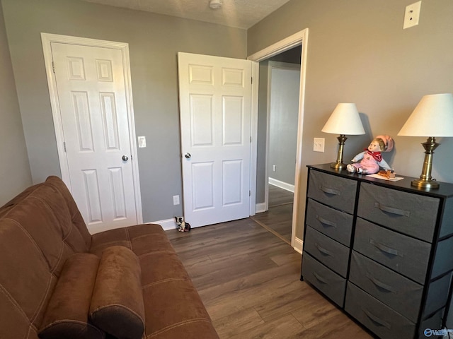 interior space with dark hardwood / wood-style floors