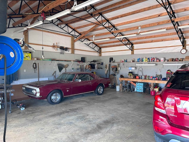 garage with a workshop area