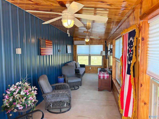 sunroom with ceiling fan, a wall mounted AC, and lofted ceiling