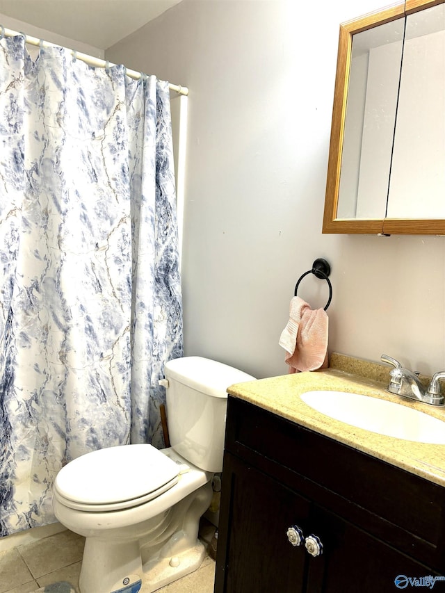 full bathroom with toilet, curtained shower, vanity, and tile patterned floors