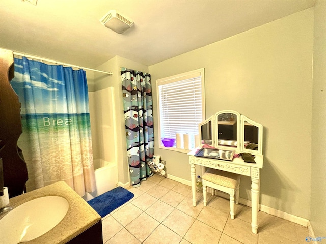 bathroom featuring vanity, baseboards, visible vents, tile patterned floors, and shower / tub combo with curtain