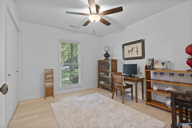 24961 Capshaw Rd, Athens, AL 35613 - office area with light wood-style floors and ceiling fan