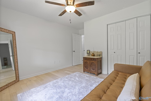 24961 Capshaw Rd, Athens, AL 35613 - bedroom with light wood-style floors, a closet, and ceiling fan