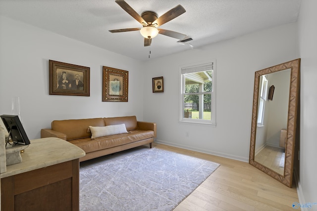 24961 Capshaw Rd, Athens, AL 35613 - living room with light wood-type flooring and ceiling fan