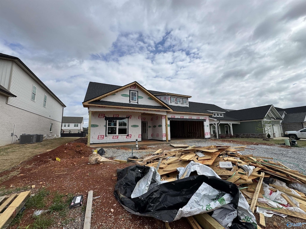 19955 Pebble Brook Ln, Athens, AL 35611 - property under construction featuring covered porch and central AC