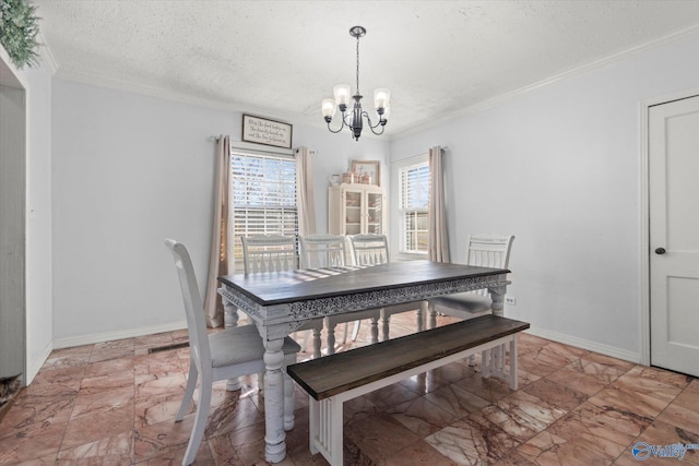 dining area featuring baseboards, a textured ceiling, an inviting chandelier, and crown molding
