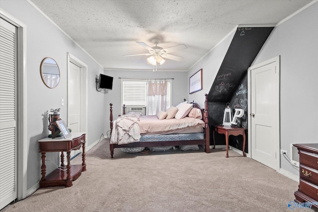 bedroom featuring baseboards, carpet flooring, a textured ceiling, and crown molding