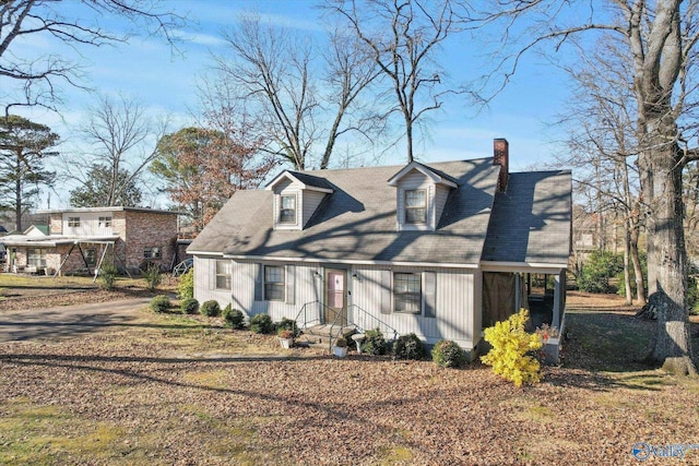 view of front of home with a chimney