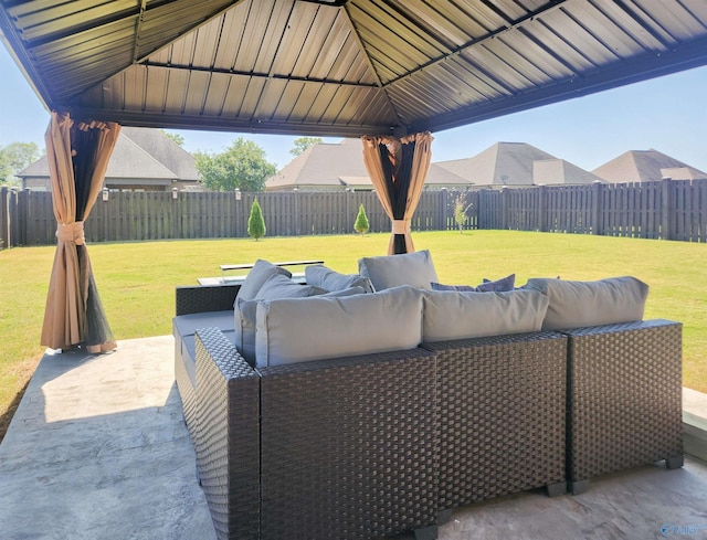 view of patio / terrace with an outdoor living space and a gazebo