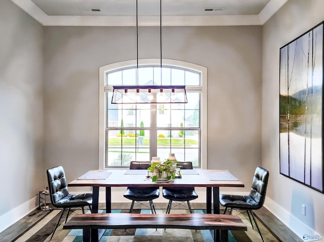 dining space featuring hardwood / wood-style floors