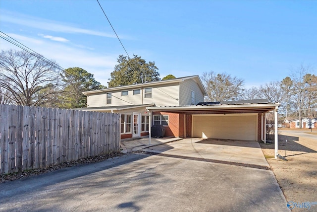 front facade with a garage