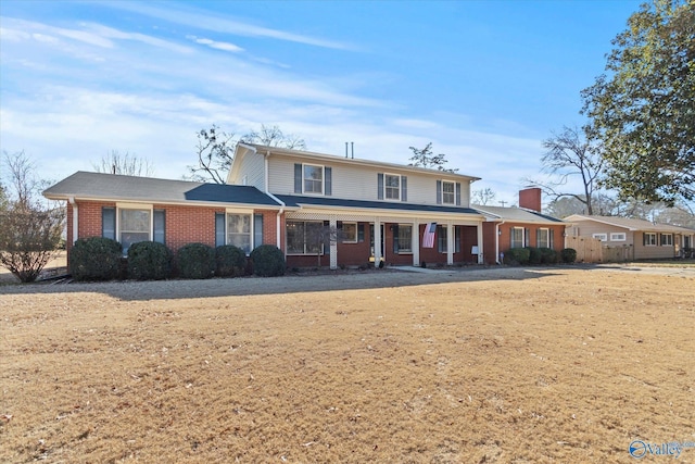 view of property with a porch