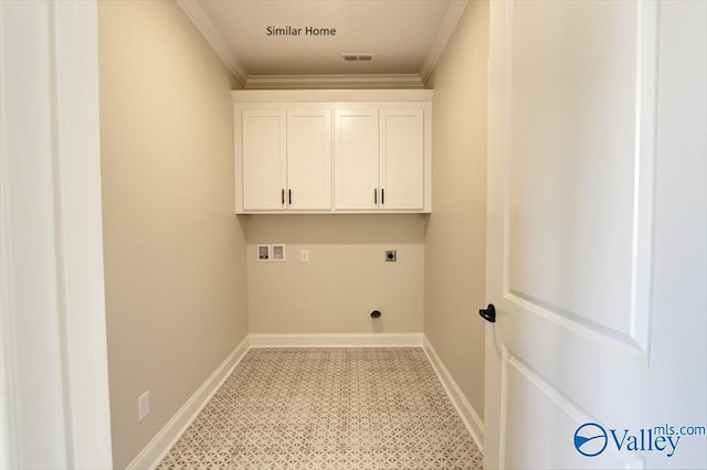 clothes washing area with cabinets, ornamental molding, hookup for a washing machine, and electric dryer hookup