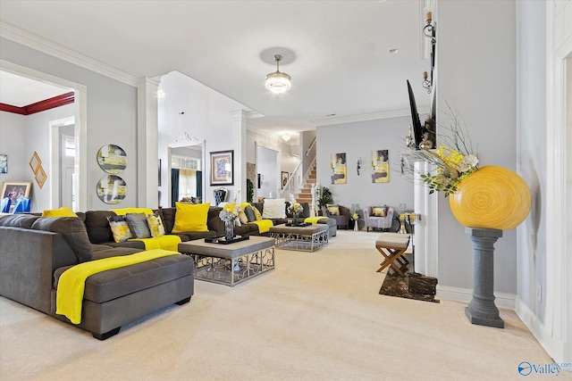 carpeted living area featuring ornamental molding, decorative columns, and stairs