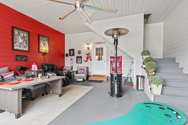 interior space with a ceiling fan