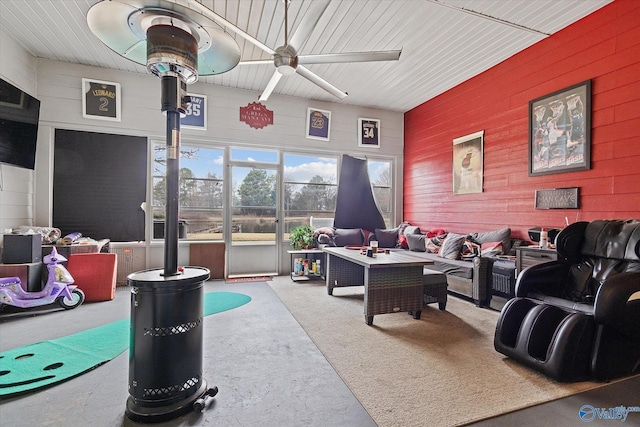 game room with carpet and ceiling fan