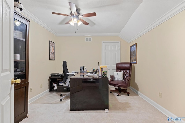 office space with visible vents, baseboards, a ceiling fan, crown molding, and carpet flooring