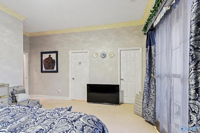 carpeted bedroom featuring ornamental molding and baseboards