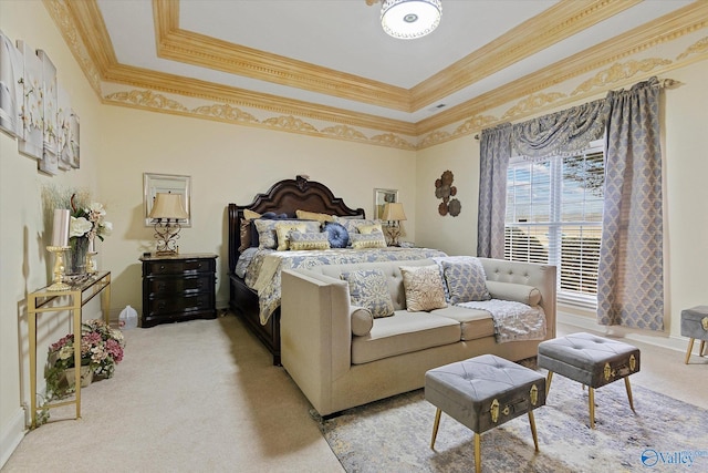 bedroom featuring visible vents, a tray ceiling, ornamental molding, and light colored carpet