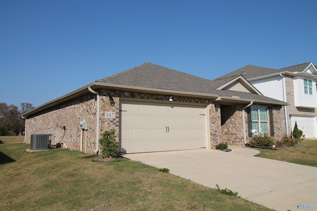 view of home's exterior with a yard, a garage, and cooling unit